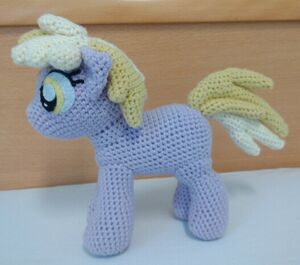 crochet wool pony plushie, lavender body, yellow mane and tail, yellow eyes